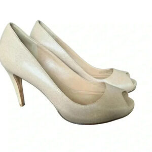“Cole Haan” and Air Nike beige peep-toe pumps. Size 8 B